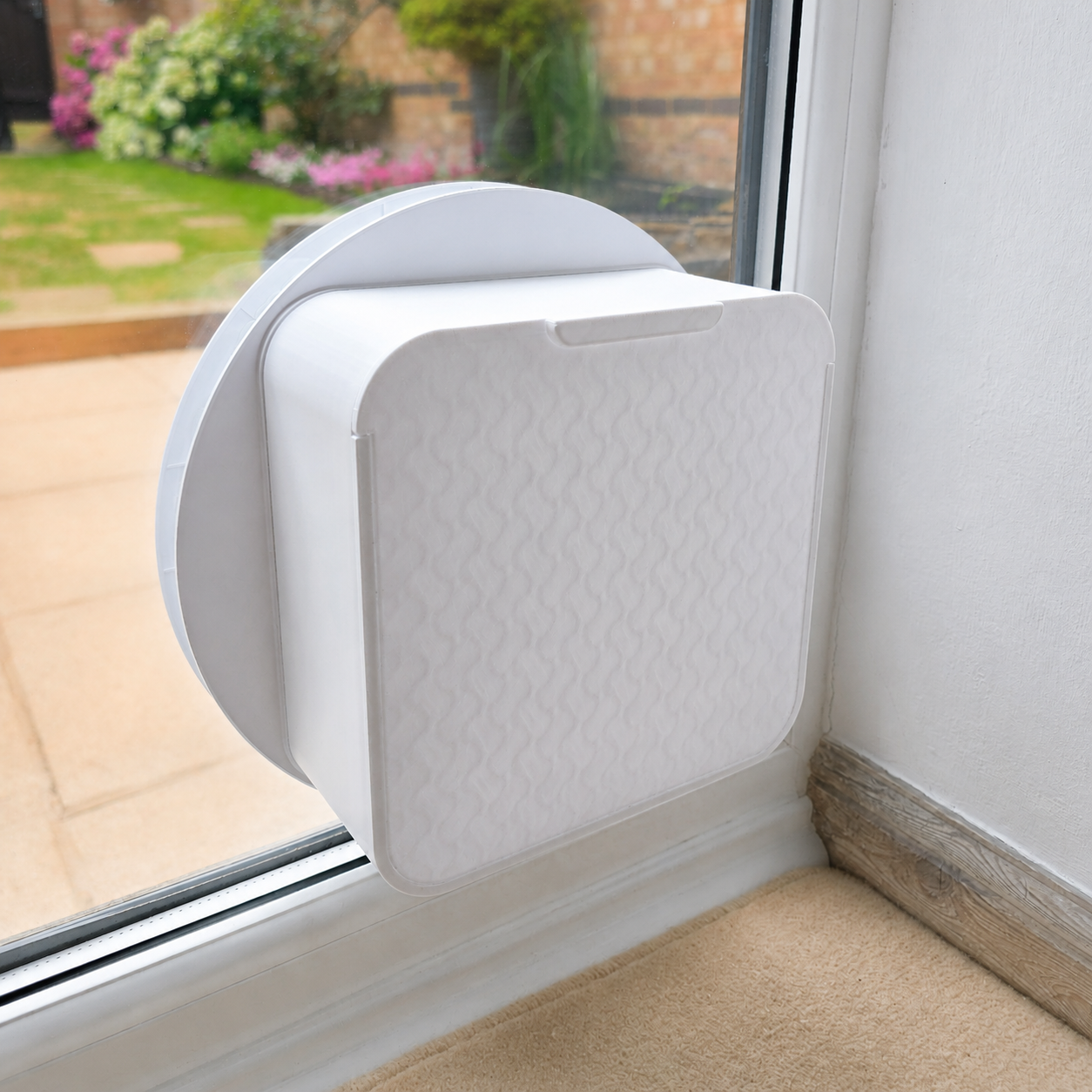 SureFlap DualScan or Connect cat flap with its sliding cover fully closed