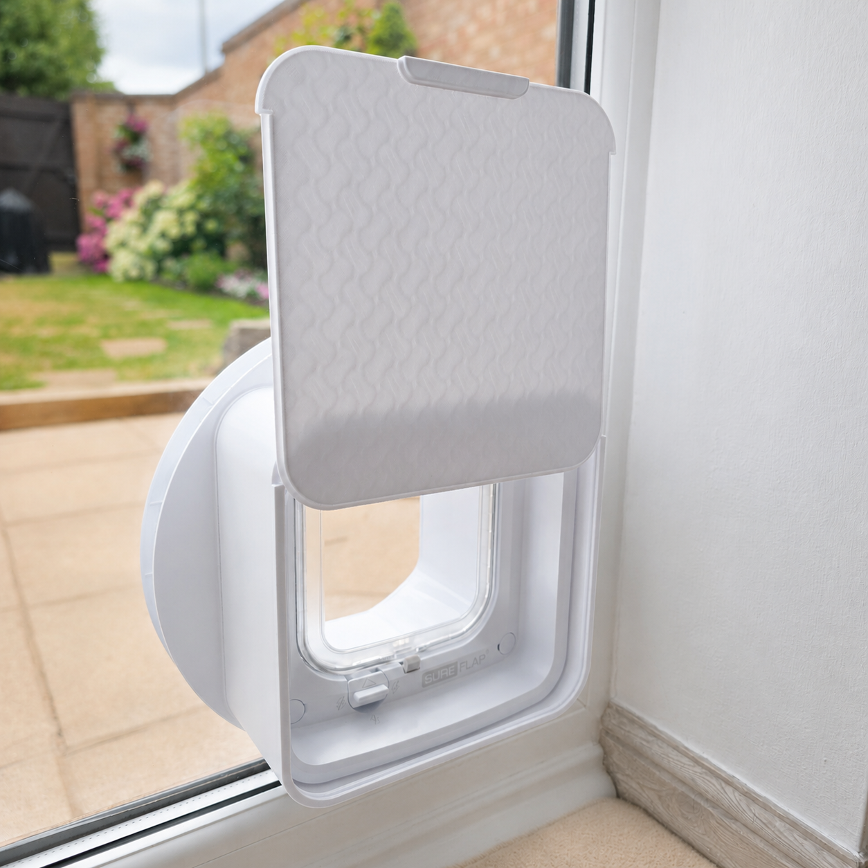 Cat Flap Cover Studio deeper sliding cover fitted to a SureFlap DualScan Microchip Cat Flap